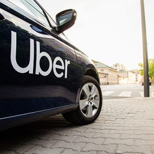 WARSAW/POLAND - APRIL 30, 2019: View on Uber car (Skoda) with inscription on the street before sunset